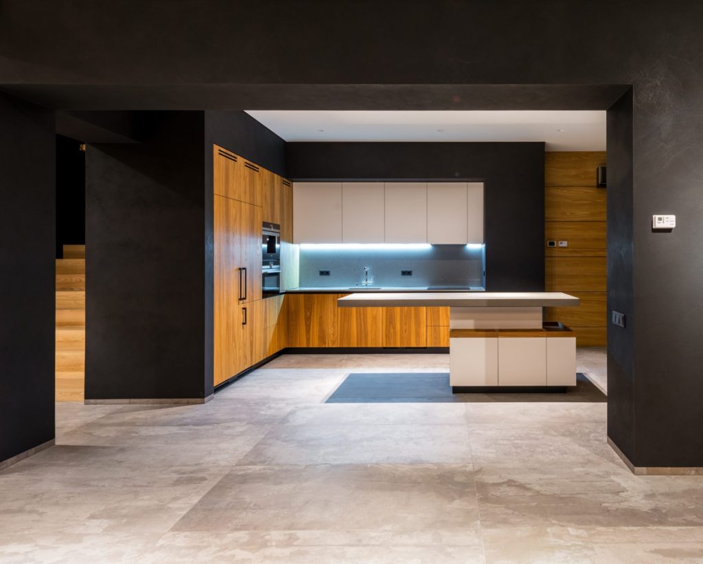 Photo of kitchen with black cabinets
